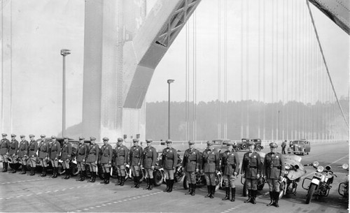 [California Highway patrol officers pose on Bay Bridge prior to opening]