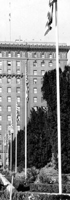 [Row of seven flag poles in Union Square Park]