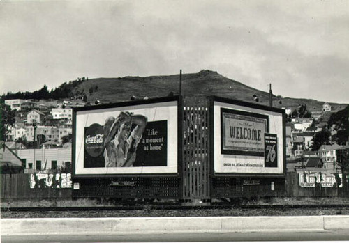 [Billboards in the Bernal Heights district, north of Monterey Boulevard]