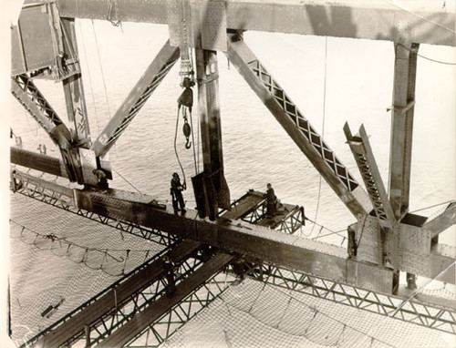 [Construction workers on the Golden Gate Bridge]