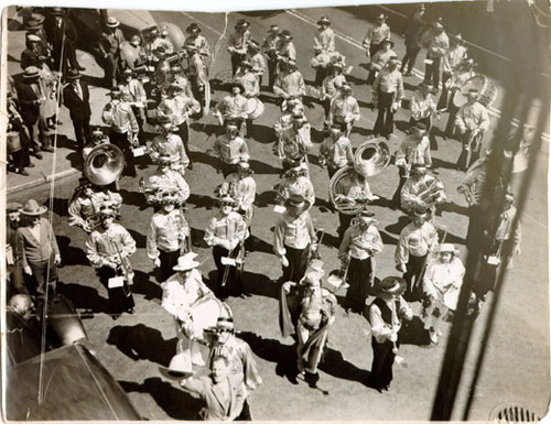 [San Francisco Municipal Band marching in costume during the Golden Gate Bridge Fiesta Parade]