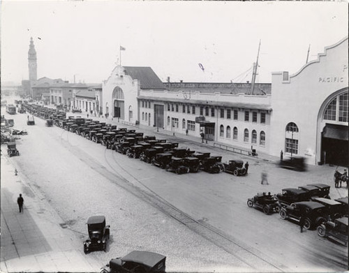 [Cars lined up on the Embarcadero, near the Ferry Building]