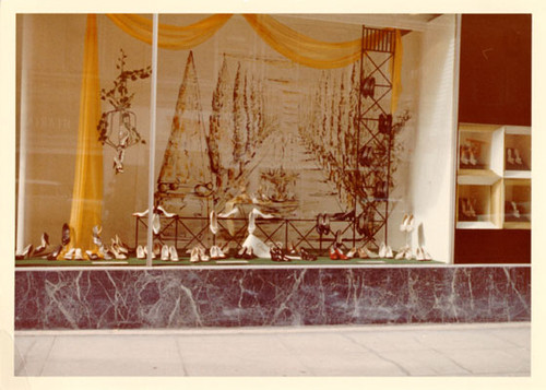 [Window display at the City of Paris department store]