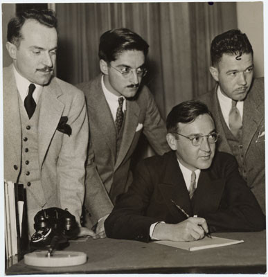 [Edmund G. Brown (seated) with Ralph B. Potts, Ralph B. Weitheimer and Francis H. De Witt]