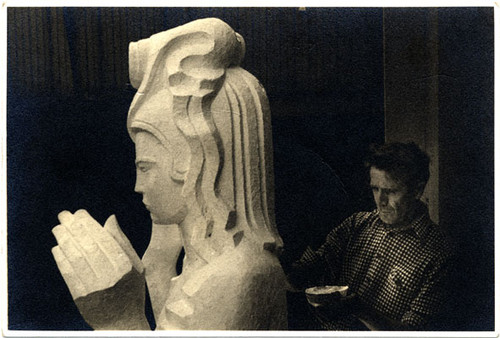 [Sculptor Ralph Stackpole working on a model of statue 'Pacifica' that will be displayed in the Court of Pacifica, Golden Gate International Exposition on Treasure Island]