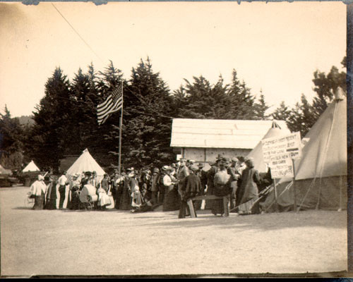 [Refugees standing in a food line]