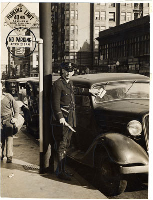 [Police officer John J. Kelly issuing parking citation ticket to a vehicle]