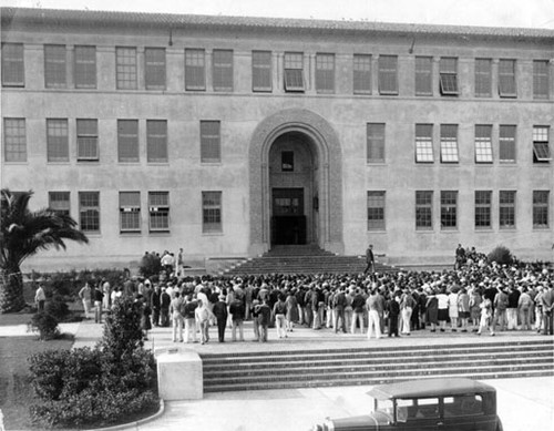 Balboa High School students crowding around the front steps of the school]