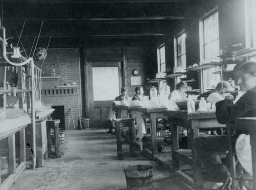 Scientific laboratory and researchers, possibly at Harvard University