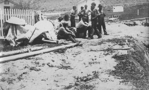 Men, including Manuel Cabral, Wesley Clarence Crandall, and Robert H. Baker gathered to salvage the wreck of the "Loma" given to the Marine Biological Association of San Diego by E.W. Scripps for research purposes; it ran aground near the lighthouse on Point Loma on July 25, 1906. The Association became the Scripps Institution of Oceanography. July 25, 1906