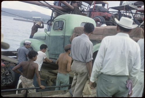 Loading dune buggy on freighter at La Paz