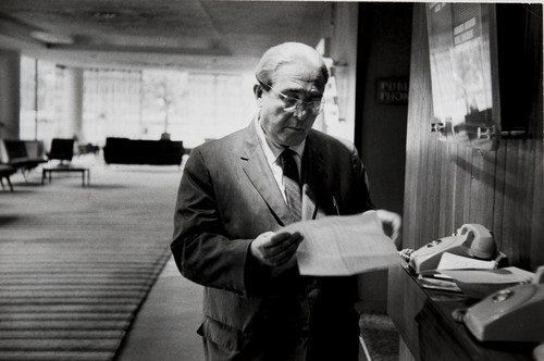 Portrait: Leo Szilard reading in the Dupont Plaza Hotel lobby; Washington, DC