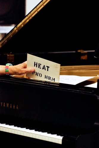 Ping: Rehearsal for 2011 UC San Diego performance: Reynolds' hand holding "Heat" cue card