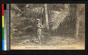 Hunter with rifle under a tree, Senegal, ca.1920-1940
