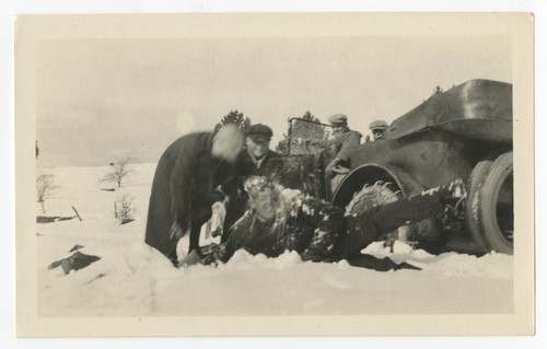 Ed Fletcher with people playing in snow on the way to Julian