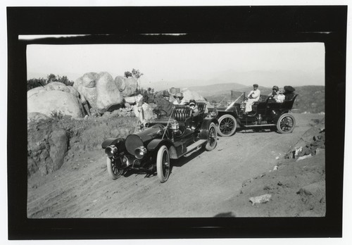 People driving on mountain road