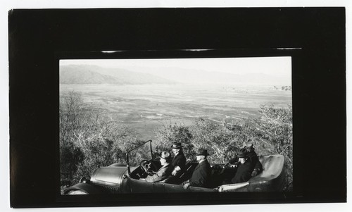 Men overlooking valley