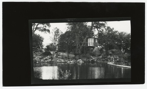 Fletcher family Eagle's Nest retreat, with swimmers poised on dam's edge, San Diego County