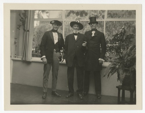 Ed Fletcher with two unidentified family members at Thanksgiving