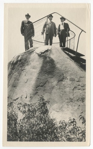 Three men at viewpoint on Grossmont Summit