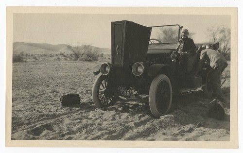 M. T. Gilmore in a car on the way to Pine Hills