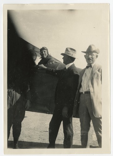 Ed Fletcher preparing for a round-trip flight from San Diego to Phoenix with pilot Hap Arnold