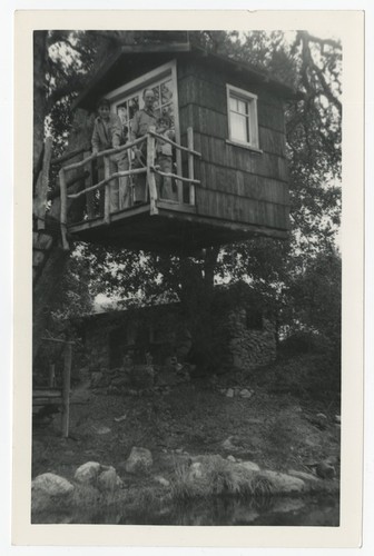 Group portrait in treehouse at Fletcher family Eagle's Nest retreat, San Diego County