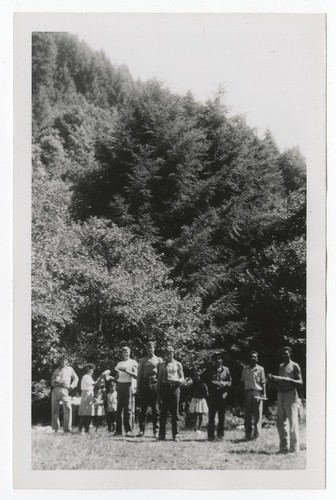 Group eating in clearing, near Klamath River