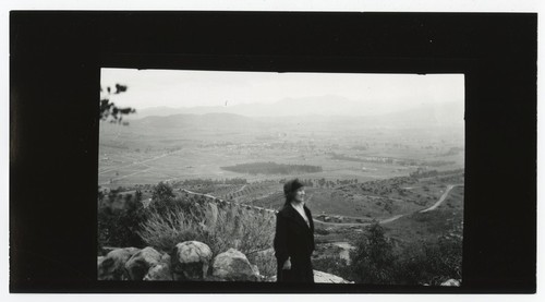 View of east San Diego County from Mount Helix with woman in foreground