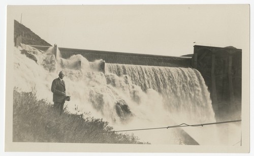 Ed Fletcher standing before Lake Hodges Dam spillway overflow