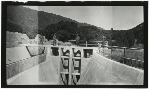 Unidentified people on Henshaw Dam outlet tunnel