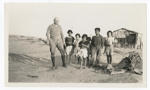 Traveler posing with San Felipe children