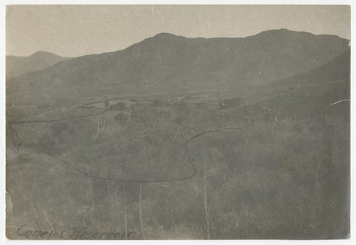 Pencil outline of El Capitan reservoir over image of Conejos Creek