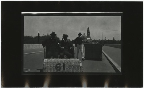 Exposition visitors riding Electriquettes on Cabrillo Bridge, Balboa Park