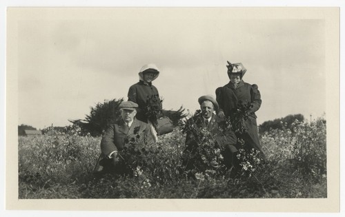 Ed and Mary Fletcher with friends in field, Linda Vista