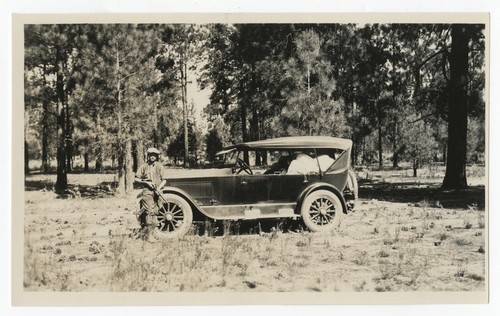 Man by parked car, Baja California