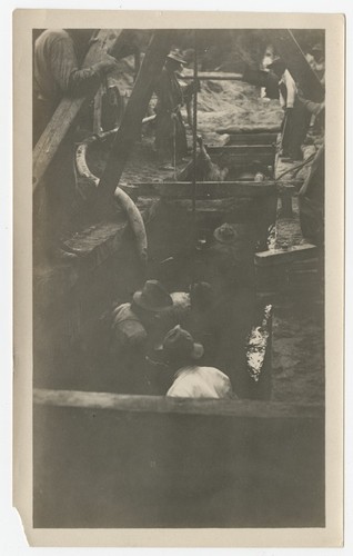 Laborers in trench during construction of the San Diego flume