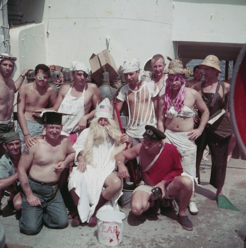 The court of King Neptune during an Equator Line-Crossing ceremony aboard the R/V Horizon