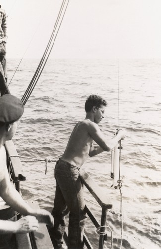 [Man with Nansen bottle aboard R/V E.W. Scripps]