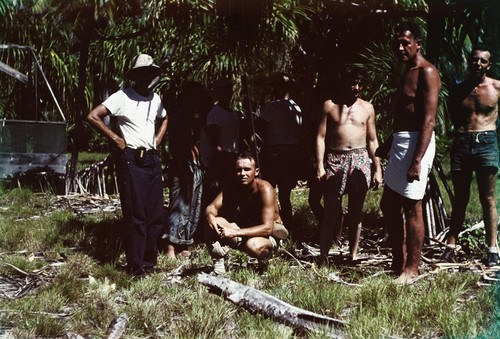 [Roger Revelle, left foreground, and scientists at Bikini encampment]