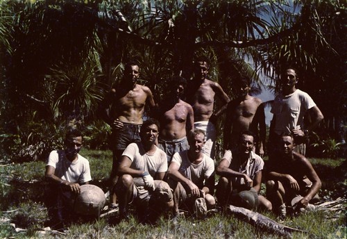 Bikini Encampment: Standing (L to R): unidentified, Robert Dill?, Roger Revelle, unidentified, Edwin Hamilton; Seated (L to R): Jeffery Frautschy, Robert Dietz, H. William Menard, K.O. Emery and Unidentified. Midpac Expedition, 1950