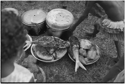 Mortuary ceremony: smoked fish on top of yams in bowls, food to be shared with mourners