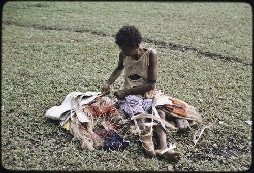 Weaving: woman makes colorful skirt from banana fibers