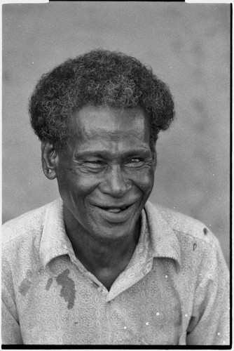 Older man, Motabasi, smiling