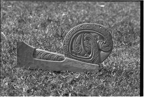 Canoe prowboard with carved design