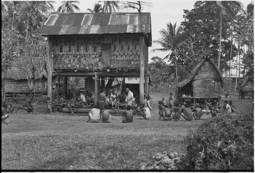 Land litigation meeting: villagers listen to claims, anthropologist Edwin Hutchins (standing) records