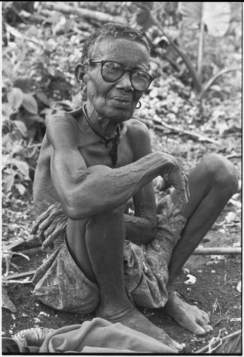 Elderly woman with glasses