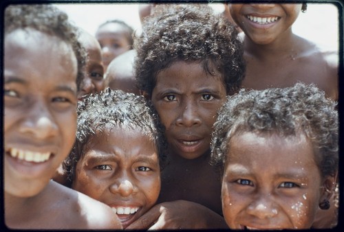 Children on the beach at Kaibola (close-up)