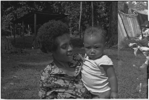 Woman holding an infant