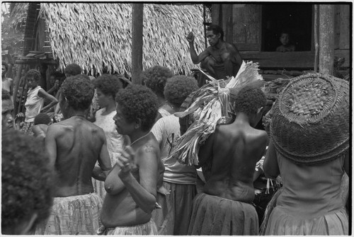 Mortuary ceremony: women with banana leaf bundles (wealth items) gathered for exchange